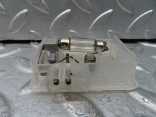 C140 Coupe glove box light used OEM