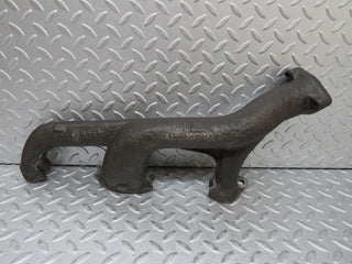 W123 exhaust manifold used OEM