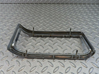 W115 tail light chrome frame left used OEM