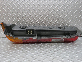 W123 tail light left side used OEM