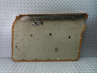 W123 front left door card panel beige light brown used OEM