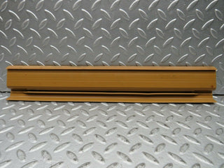 W123 Wagon rear right door sill trim palomino used OEM