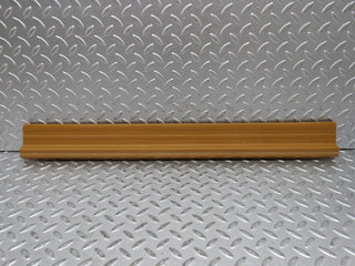 W123 front right door sill trim palomino used OEM