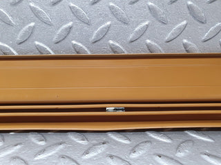 W124 front left door sill trim palomino used OEM