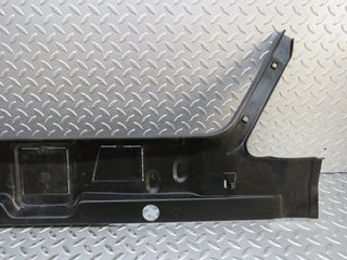 W124 Coupe trunk lock trim panel used OEM