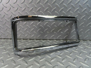 W115 tail light chrome frame left used OEM