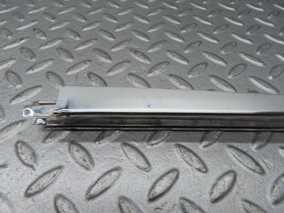 W111 rear left door front chrome window channel used OEM
