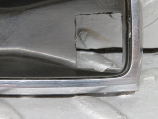W108 chrome frame for door opener front right used OEM