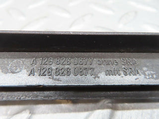R129 SL right headlight lower trim used OEM