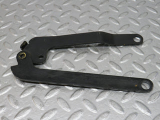R107 SLC bonnet hinge left side used OEM