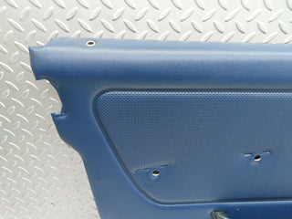 W123 front left door card blue used OEM