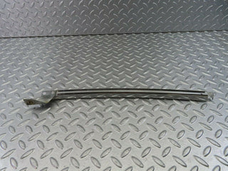 W123 rear left chrome window channel used OEM