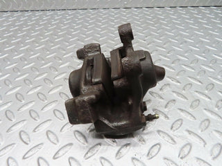W140 rear left brake caliper used OEM