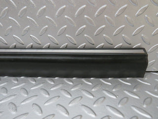 W123 front left door lower moulding trim used OEM