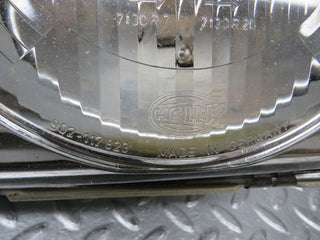 W123 headlight left side used OEM