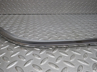 W109 rear left door chrome window frame used OEM