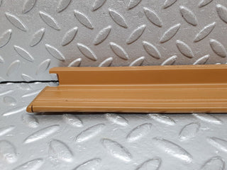 W124 front left door sill trim palomino used OEM