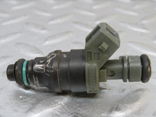 W124 Coupe fuel injector used OEM