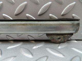 W108 front left door glass holder used OEM