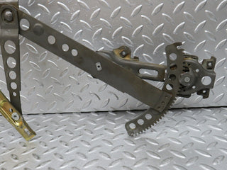W123 Wagon front left manual window regulator used OEM