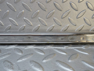 W109 front left door sill chrome used OEM