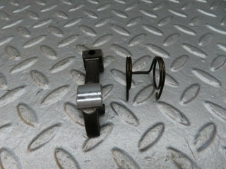 W123 valve rocker arm with retaining spring used OEM
