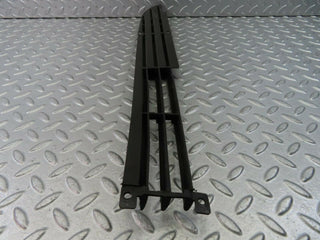 W115 front lower grill left used OEM