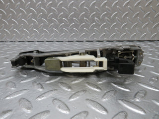 W124 rear left exterior door handle used OEM