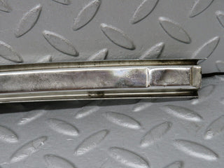 W108 front left door chrome window channel used OEM