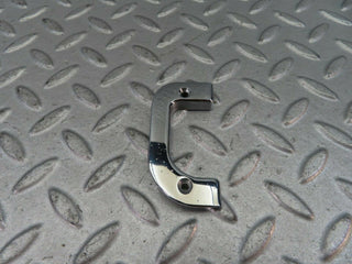 W123 left interior chrome door latch trim used OEM