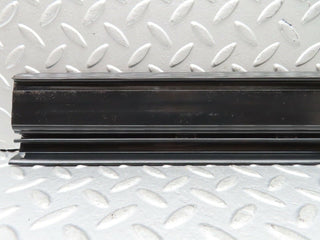 W123 front left door sill trim black used OEM