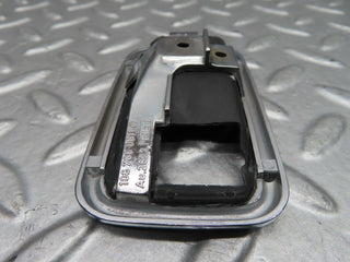 W123 door opener chrome frame right used OEM