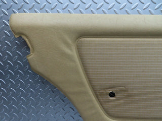 W123 rear left door card beige used OEM