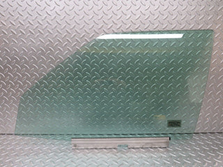 W124 front left door window glass used OEM