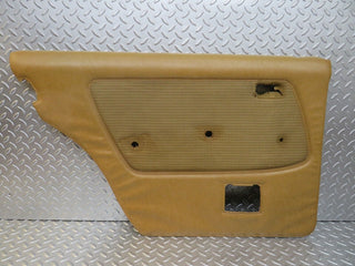 W123 rear left door card palomino used OEM