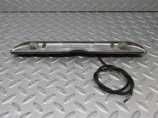 W108 number plate light trunk lid chrome used OEM