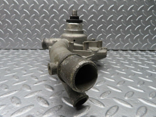 W123 water pump used OEM
