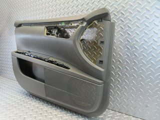 W221 front left door card used OEM