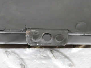 W109 rear axle mount plastic cover used OEM