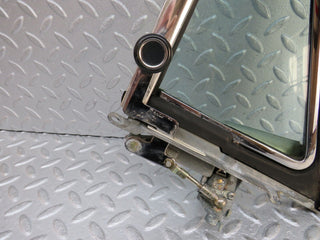 W109 front left quarter window glass used OEM