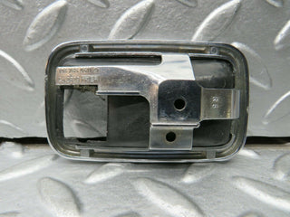 W123 Wagon chrome frame for door opener right used OEM