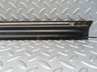 W123 front left door lower trim used OEM