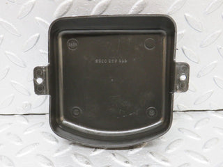 W109 rear axle mount plastic cover used OEM