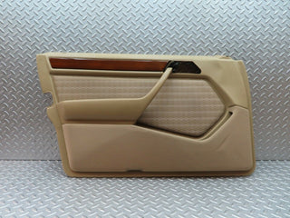 W124 front left door card beige used OEM