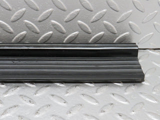 W123 rear right door sill trim black used OEM