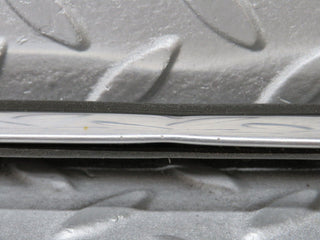 W109 front left fender wing centre moulding trim used OEM