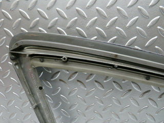 R107 SLC rear window trim left used OEM