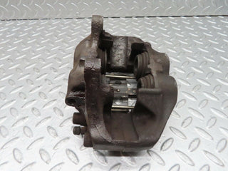 W140 front brake caliper left side used OEM