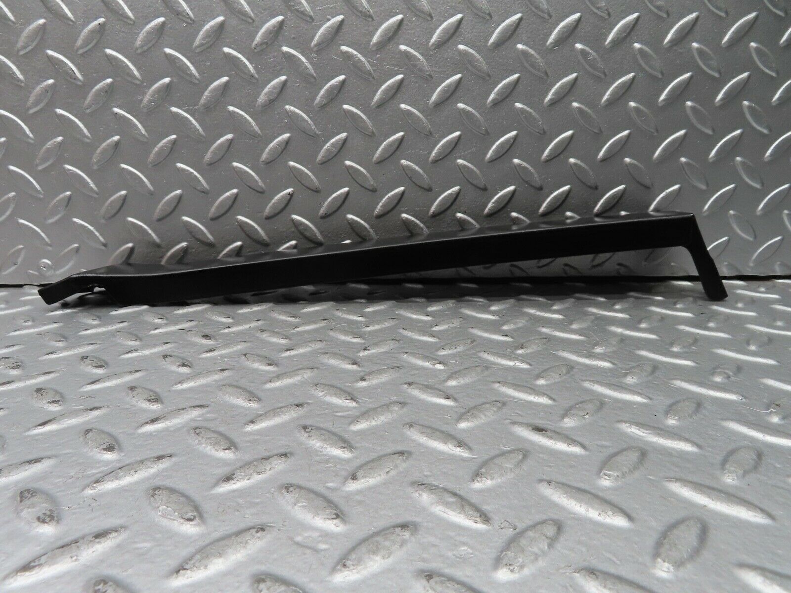 21682 Mercedes-Benz W126 300SE Left Headlight Lower Trim