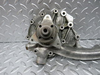 W124 water pump used OEM
